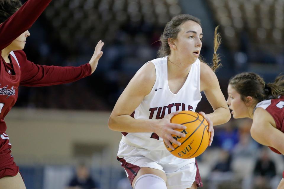 during a Class 4A girls basketball state tournament Tuttle's Allie Rehl looks to pass semifinal game between Tuttle and Weatherford in the State Fair Arena at the OKC Fairgrounds in Oklahoma City, Friday, March 11, 2022. 