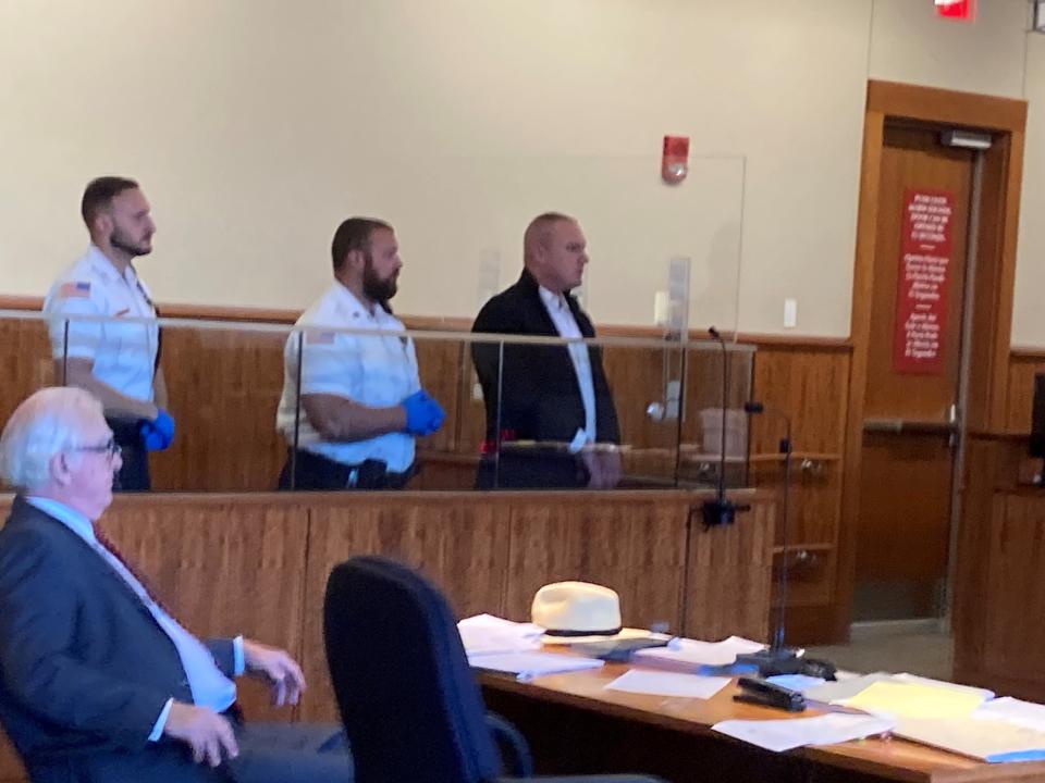 Fall River Police Officer Michael Morin seen here at his arraignment in June on one count of possession of child pornography. Morin is asking to have the charge dismissed on grounds the photo was of his 17-year-old girlfriend that she sent to him and not pornographic.