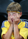 DONETSK, UKRAINE - JUNE 19: Ukraine fans react during the UEFA EURO 2012 group D match between England and Ukraine at Donbass Arena on June 19, 2012 in Donetsk, Ukraine. (Photo by Scott Heavey/Getty Images)