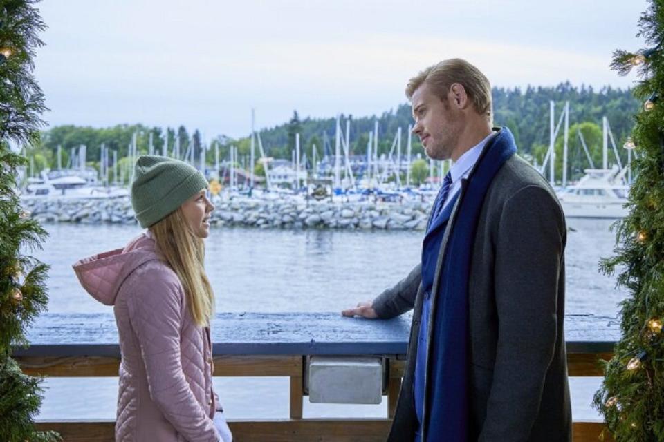 Payton Lepinski, left, and Trevor Donovan play father and daughter in Hallmark Channel's "Nantucket Noel," though the characters have a different relationship in Nancy Thayer's novel "Let It Snow."