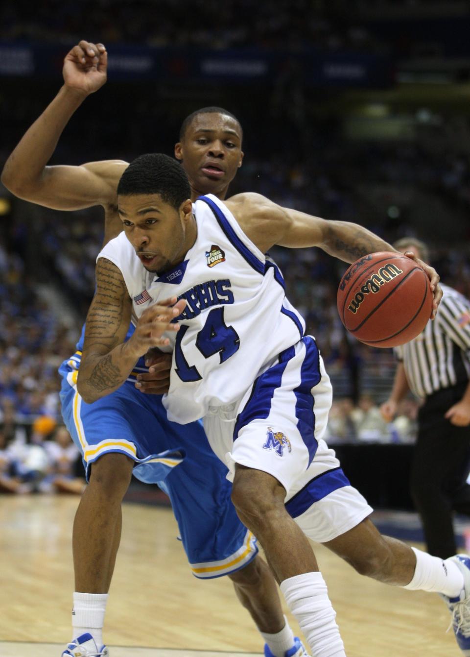 Memphis' Chris Douglas-Roberts, who averaged 28 points a game as a high school junior at Cass Tech, drives against a UCLA defender during second half action during a NCAA Men's Basketball Championship Final Four semifinal game at the Alamodome in San Antonio, Texas, April 5, 2008.