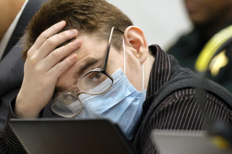 FILE - Marjory Stoneman Douglas High School shooter Nikolas Cruz listens to testimony while seated at the defense table during the penalty phase of his trial at the Broward County Courthouse, Friday, July 22, 2022, in Fort Lauderdale, Fla. Cruz previously plead guilty to all 17 counts of premeditated murder and 17 counts of attempted murder in the 2018 shootings. (Mike Stocker/South Florida Sun-Sentinel via AP, Pool, File)