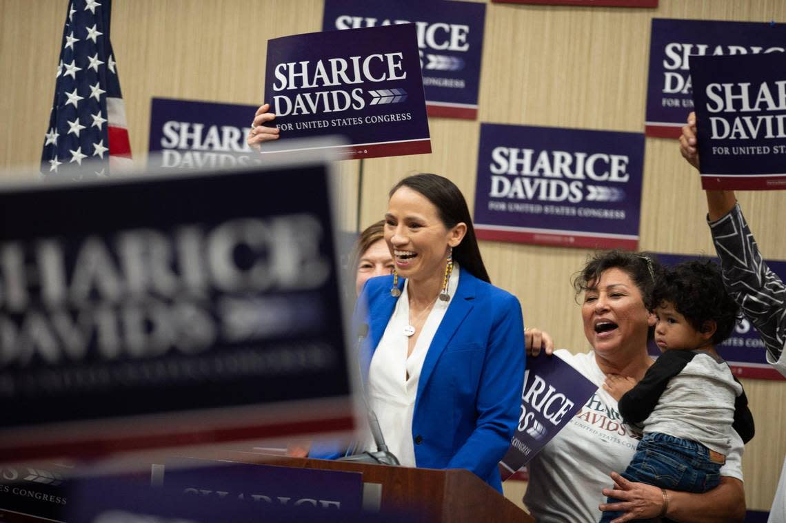 Kansas 3rd District Rep. Sharice Davids greets a crowd of supporters to give her victory speech at the Sheraton Hotel in Overland Park after defeating challenger Amanda Adkins in the midterm election Tuesday, Nov. 8, 2022.