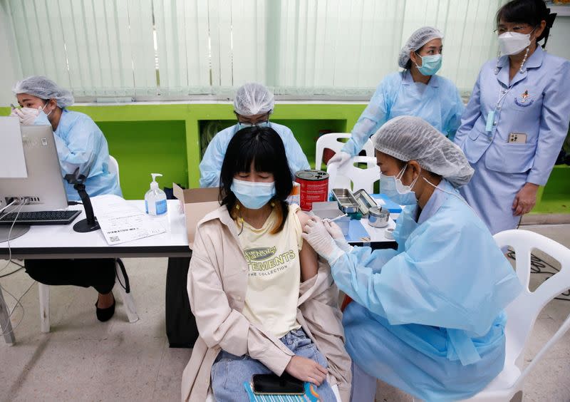 Ahead of schools reopening, high school students get vaccinated in Bangkok