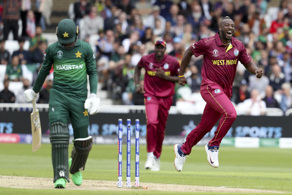 West Indies' Andre Russell celebrates bowling Pakistan's Fakhar Zaman during their Cricket World Cup match at Trent Bridge cricket ground in Nottingham, England, Friday, May 31, 2019. (AP Photo/Rui Vieira)