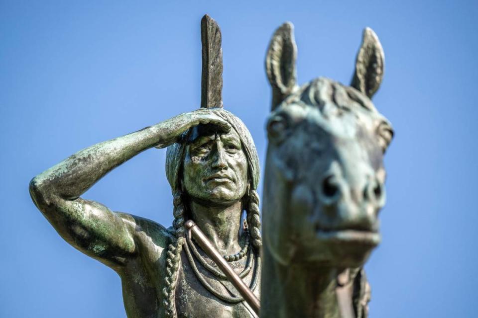 In 1916, Chief Sitting Bull’s son, Little Bull, took note of The Scout’s headdress, with hair parted and braided, and the bridle was “just as it should be” for a Lakota. Emily Curiel/ecuriel@kcstar.com