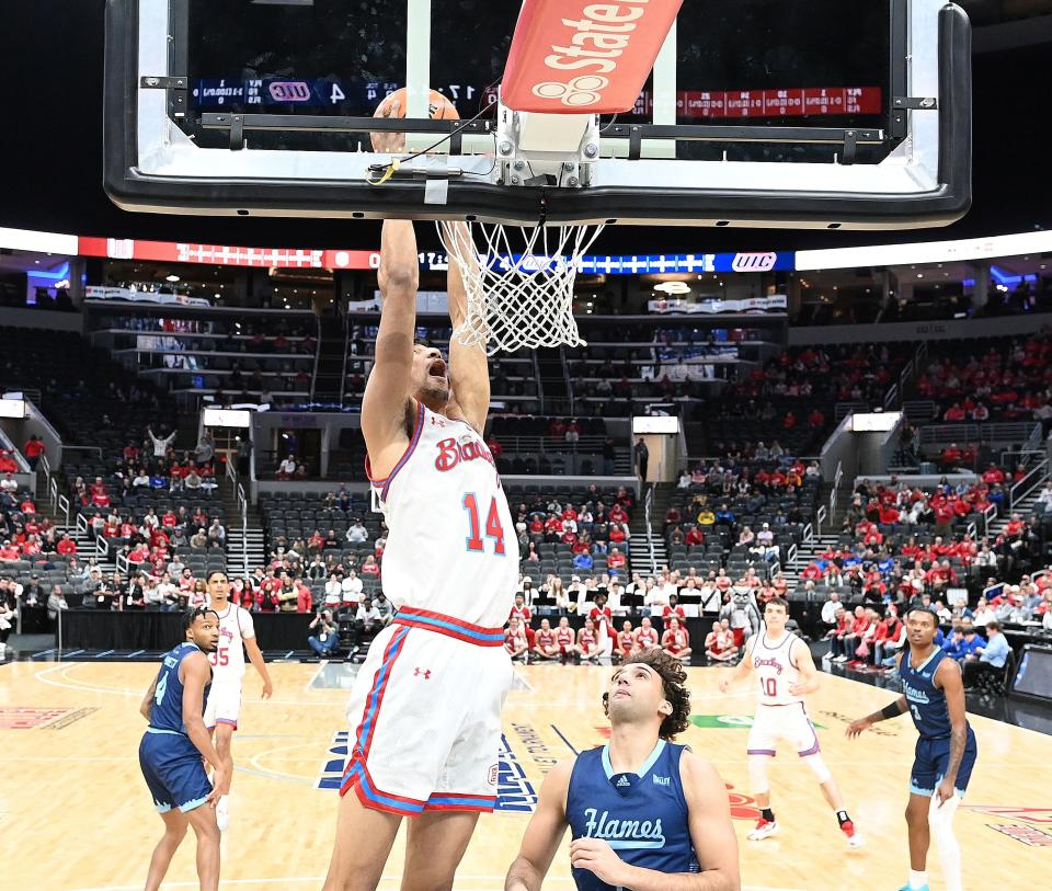 Malevy Leons throws down a dunk during the Braves 74-47 blowout win over UIC in the quarterfinals of the Missouri Valley Conference Tournament at Enterprise Center in St. Louis on Friday, March 8, 2024.