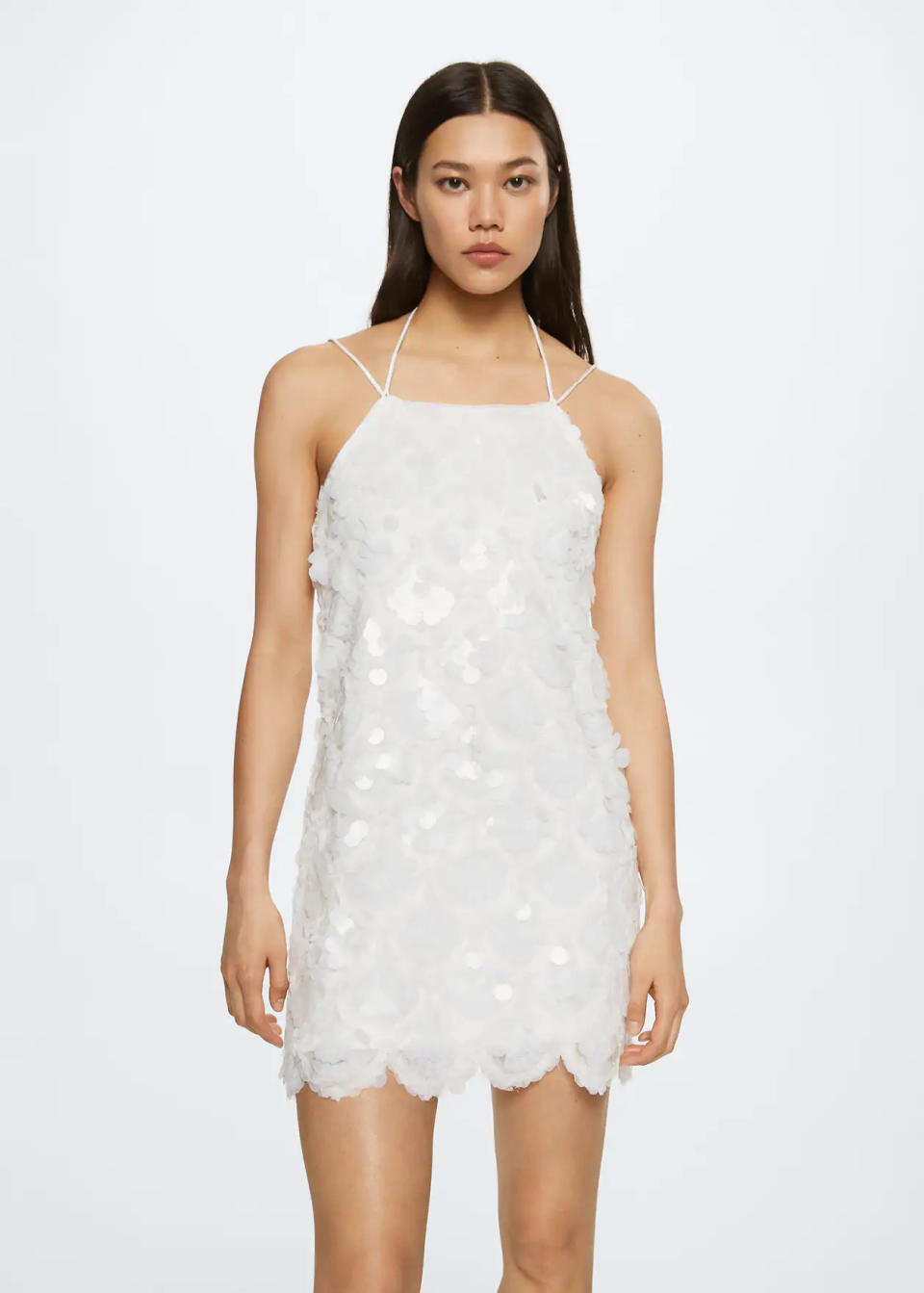 Sequined halter neck dress. Image via Mango.