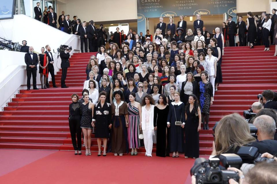 Actresses and filmmakers walk the red carpet in protest of the lack of female filmmakers honored throughout the history of the festival at the screening of “Girls Of The Sun” during the 71st annual Cannes Film Festival - Credit: Dave Bedrosian/Geisler-Fotopress/picture-alliance/dpa/AP Images