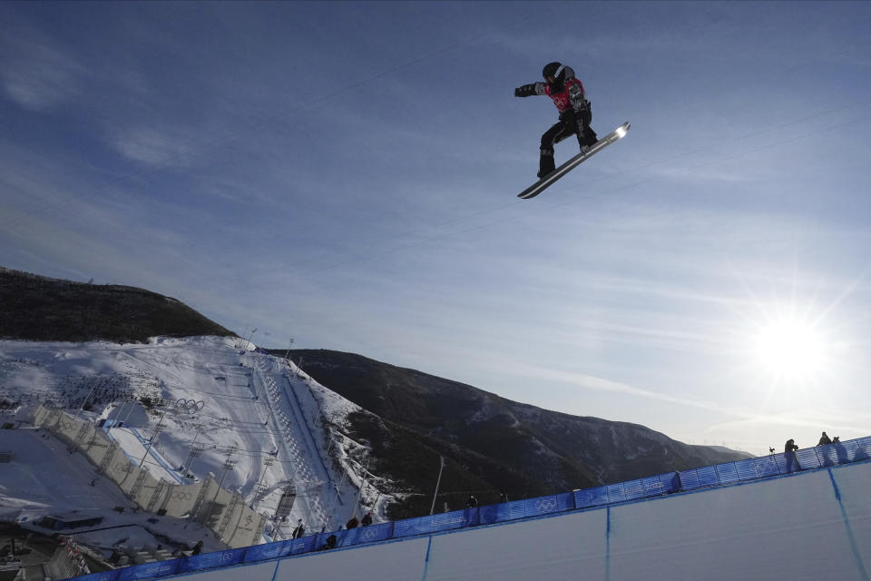 FILE - Shaun White trains before the men's halfpipe finals at the 2022 Winter Olympics, Friday, Feb. 11, 2022, in Zhangjiakou, China. A key part in the first episode of the documentary series “Shaun White: The Last Run” zeroes in on the exact moment White decided to try to make a living out of snowboarding instead of trying to make friends. The four-part series documenting White's life and career starts Thursday, July 6, 2023, on MAX. (AP Photo/Gregory Bull, File)