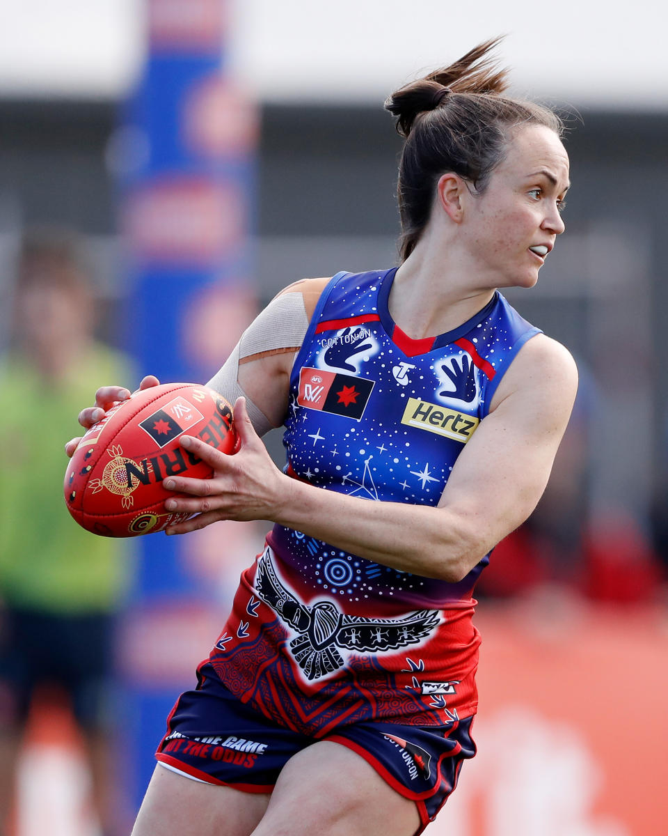 Daisy Pearce (pictured) in action during an AFL game.