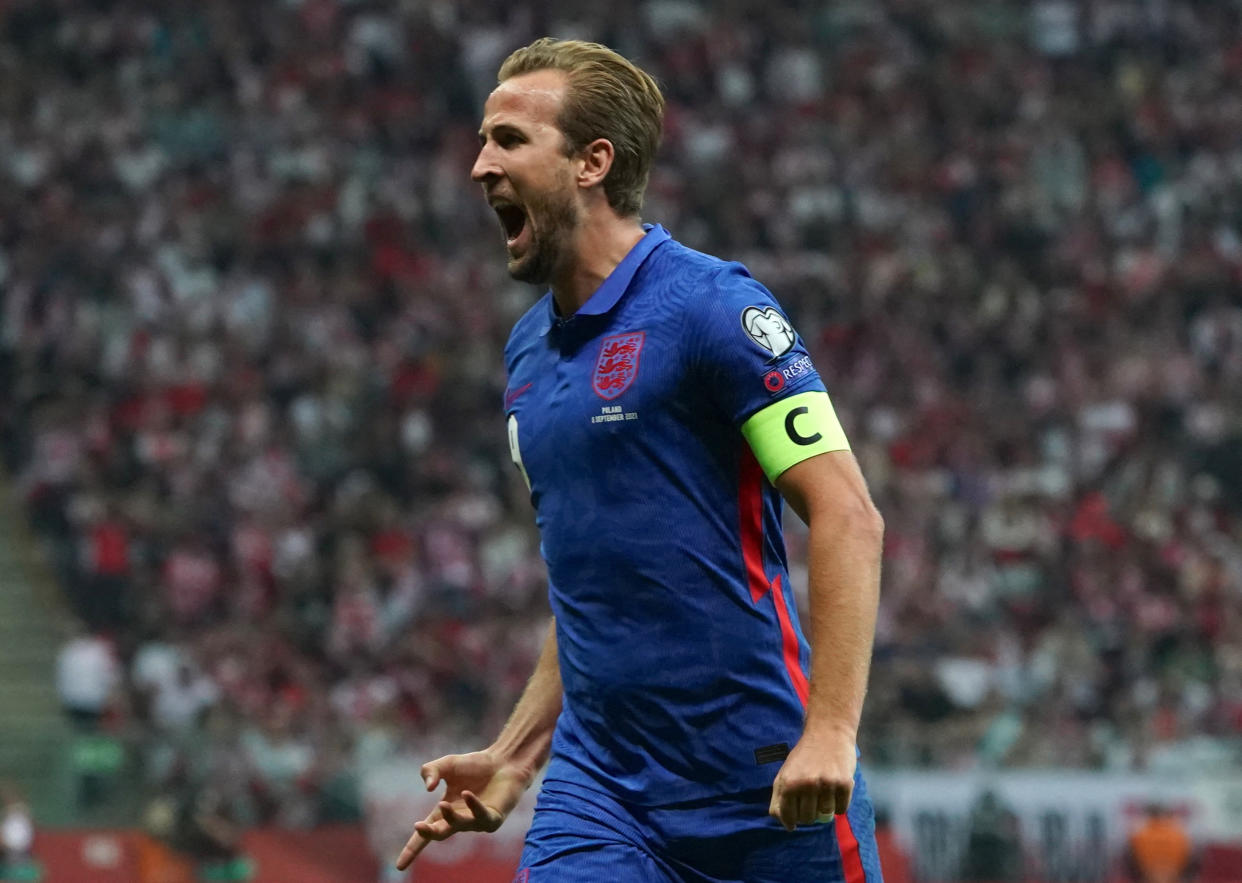 England's forward Harry Kane celebrates after scoring the opening goal.