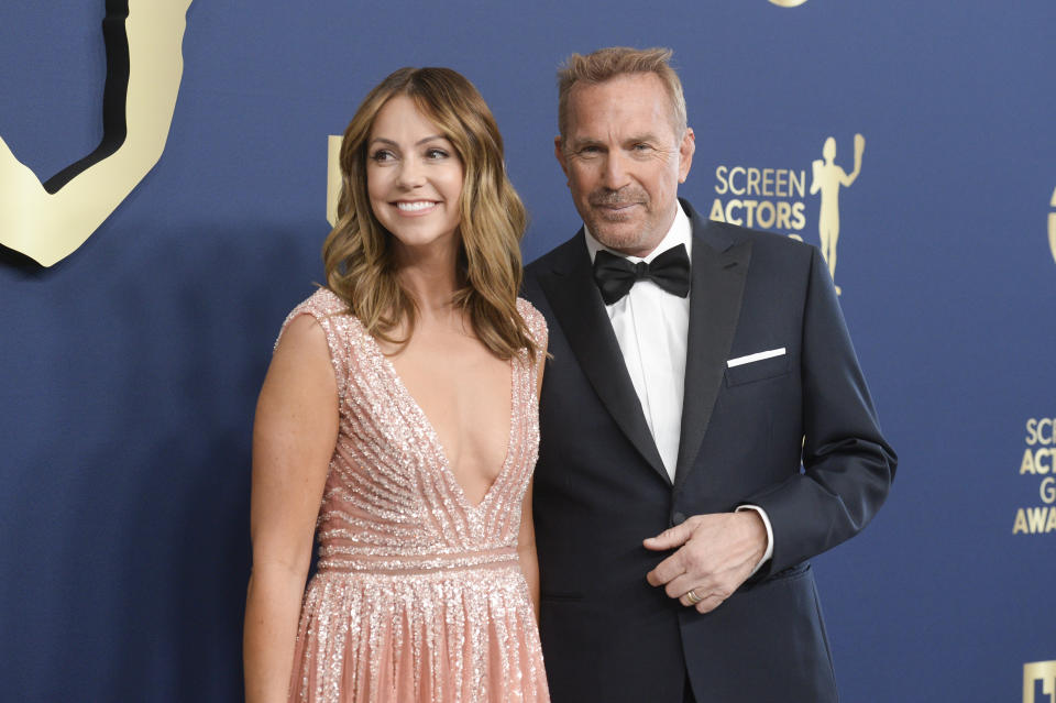 Christine Baumgartner and Kevin Costner at the 28th Screen Actors Guild Awards held at Barker Hangar on February 27th, 2022 in Santa Monica, California. (Photo by Gilbert Flores/Variety/Penske Media via Getty Images)