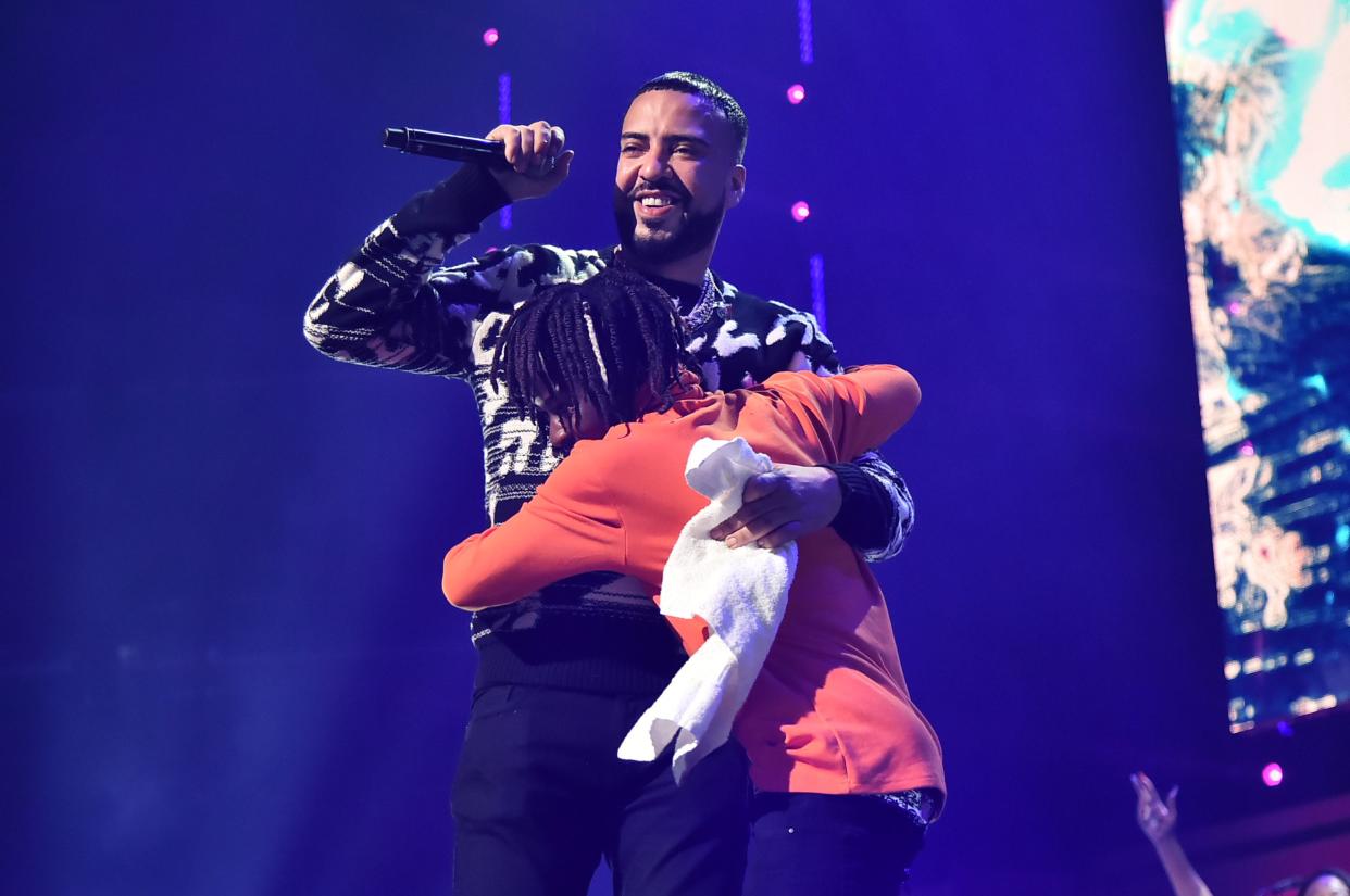 French Montana Hugging Someone on stage