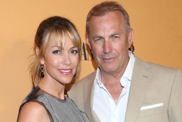 Mediapunch/Shutterstock Christine Baumgartner and Kevin Costner