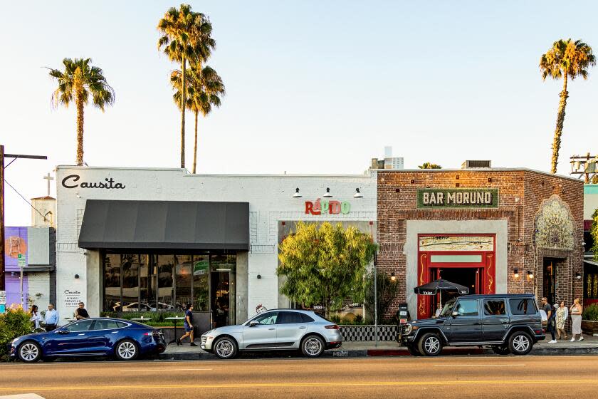 Causita restaurant, Rapido takeout shop and Bar Moruno sitting in a row on Sunset Blvd. in Silver Lake.