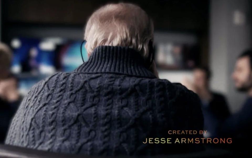 Logan wearing one of his iconic cardigans in the opening credits of the show - Courtesy of HBO