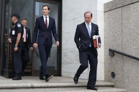 White House Senior Adviser Jared Kushner (C) and his attorney Abe Lowell (R) depart following Kushner's appearance before a closed session of the Senate Intelligence Committee as part of their probe into Russian meddling in the 2016 U.S. presidential election, on Capitol Hill in Washington, U.S. July 24, 2017. REUTERS/Aaron P. Bernstein