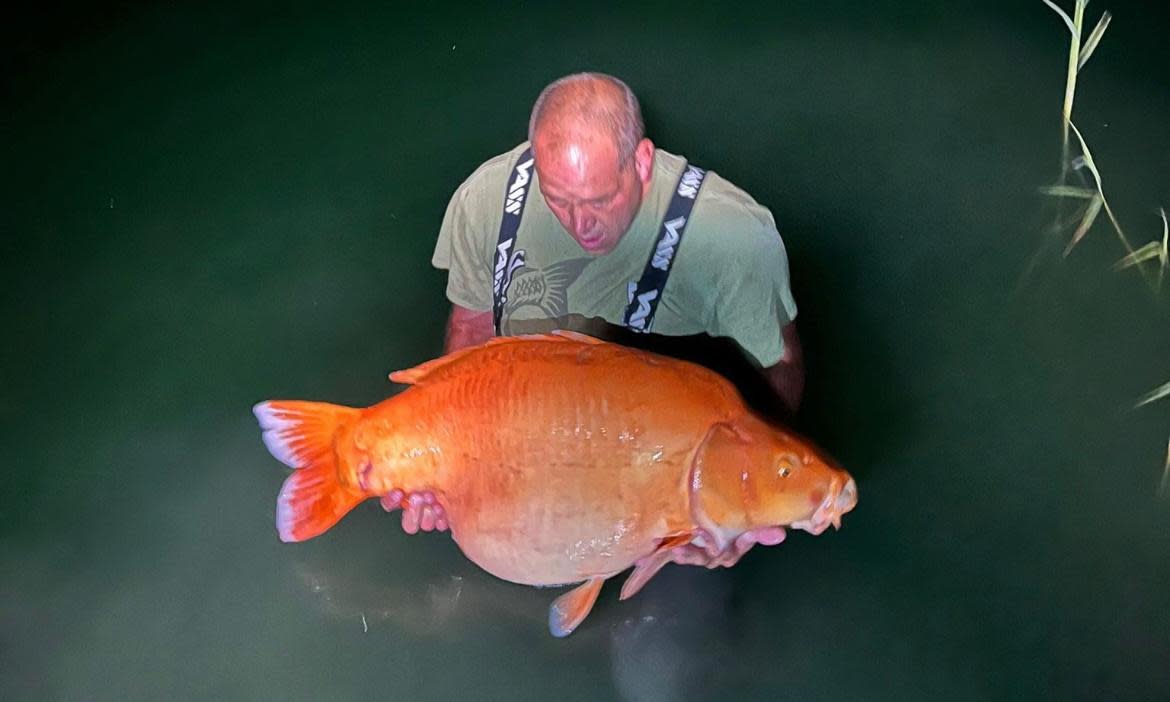 <span>‘My hands shook as I weighed it’: Lee Parker with his prize catch. </span><span>Photograph: courtesy of Lee Parker</span>