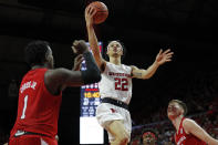 Rutgers guard Caleb McConnell (22) drives to the basket past Nebraska forward Kevin Cross (1) during the second half of an NCAA college basketball game Saturday, Jan. 25, 2020, in Piscataway, N.J. Rutgers won 75-72. (AP Photo/Adam Hunger)