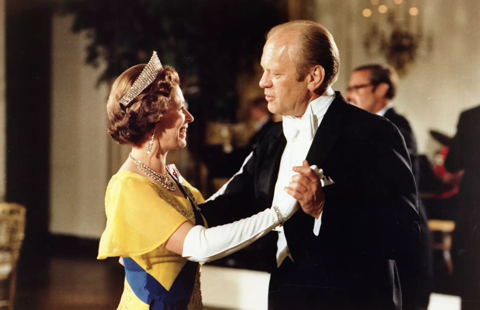 The Queen dances with Gerald Ford. (Getty)