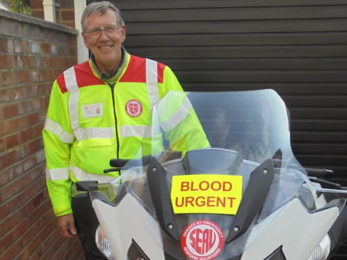 Mr Lougee with his emergency response motorbike (Facebook / SERV Suffolk & Cambridgeshire)