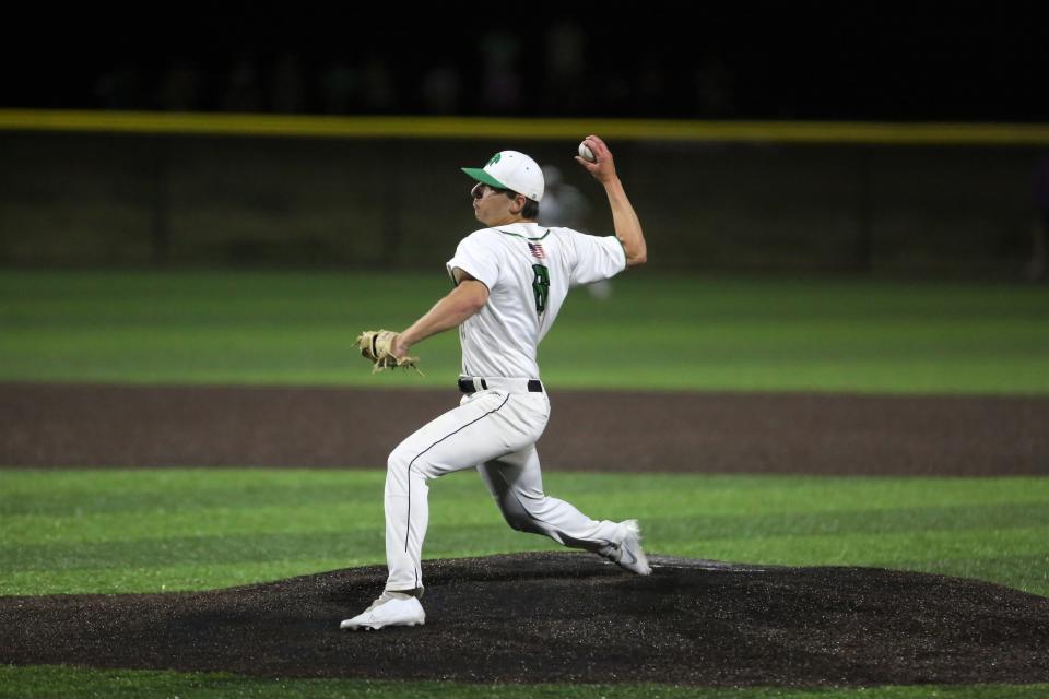 New Castle baseball senior Corbin Malott earned the pitching save in the regional championship against Fort Wayne Bishop Dwenger at Oak Hill High School on Saturday, June 4, 2022.