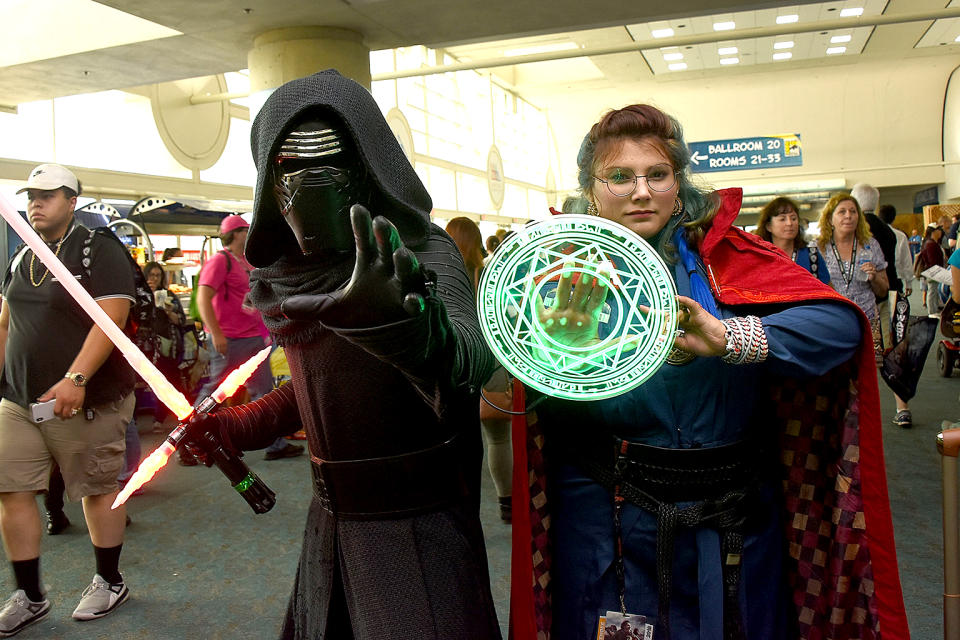 <p>Cosplayers dressed as Kylo Ren and Doctor Strange at Comic-Con International on July 19, 2018, in San Diego. (Photo: Araya Diaz/Getty Images) </p>