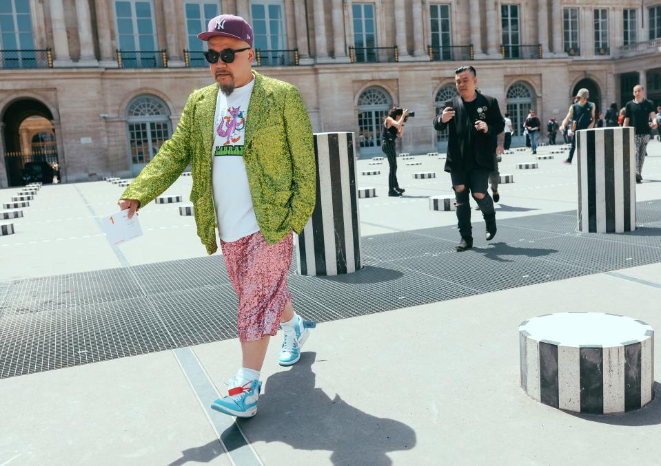 <h1 class="title">In a Comme des Garçons jacket and shorts with Nike x Off-White shoes</h1><cite class="credit">Photographed by Phil Oh</cite>