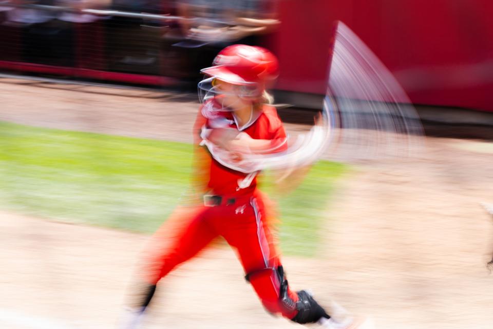 Utah infielder Sophie Jacquez (9) hits the ball during the third game of the NCAA softball Super Regional between Utah and San Diego State at Dumke Family Softball Stadium in Salt Lake City on Sunday, May 28, 2023. | Ryan Sun, Deseret News