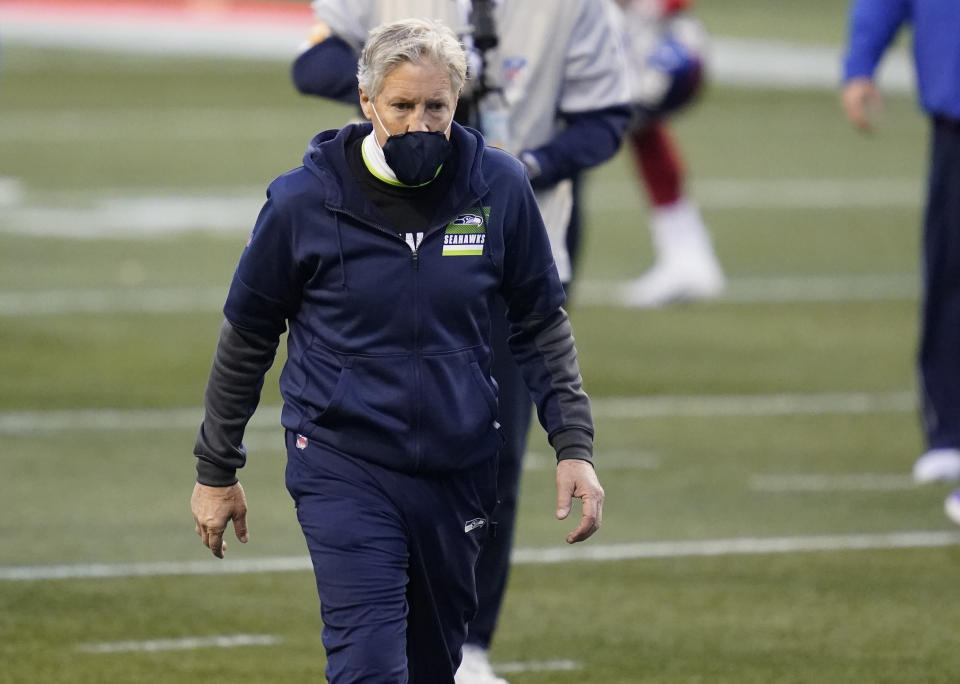 Seattle Seahawks head coach Pete Carroll walks off the field after an NFL football game against the New York Giants, Sunday, Dec. 6, 2020, in Seattle. The Giants won 17-12. (AP Photo/Elaine Thompson)