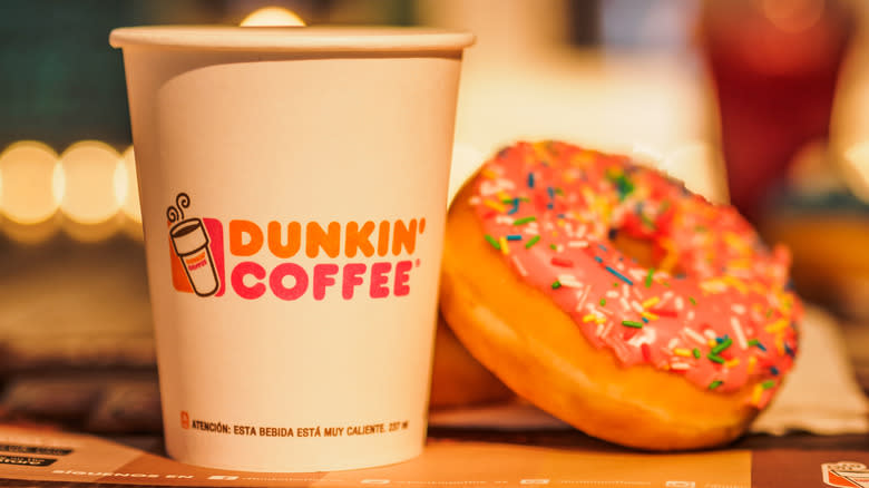 Dunkin' coffee cup and donut