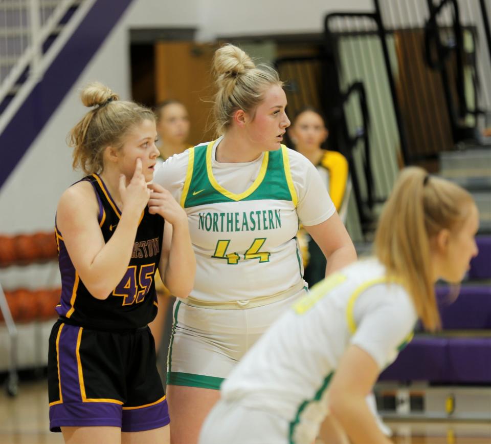Northeastern junior Addisen Mastriano (right) and Hagerstown senior Delaney Oliger (left) look down the court during a sectional game Jan. 31, 2023.