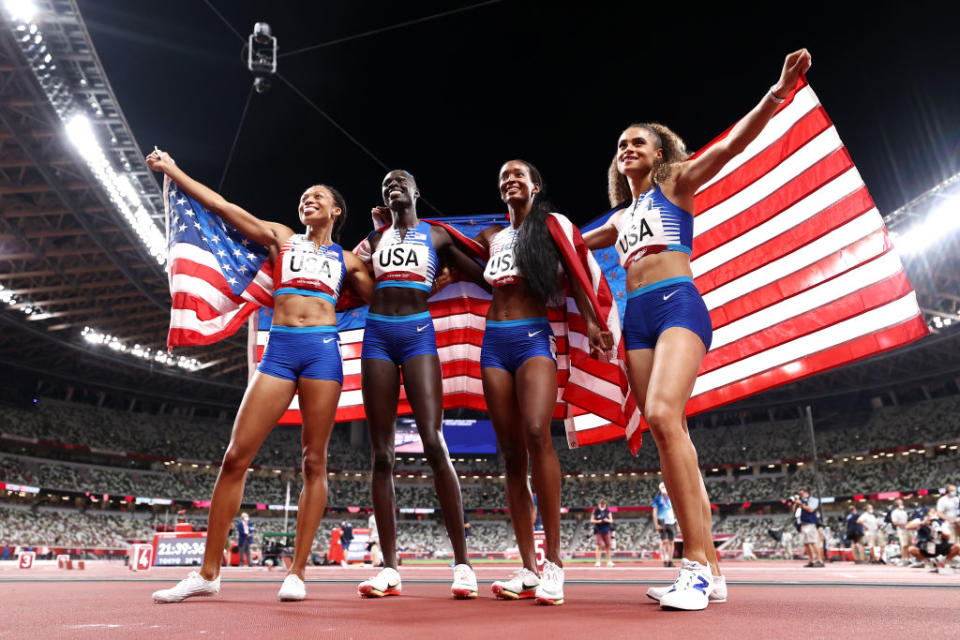 Allyson Felix, Athing Mu, Dalilah Muhammad and Sydney McLaughlin of Team USA celebrate winning the gold medal in the Women's 4x400-m Relay Final on day fifteen of the Tokyo Olympic Games at Olympic Stadium on Aug. 07, 2021 in Tokyo, Japan.<span class="copyright">Ryan Pierse—Getty Images</span>