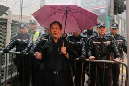 Police prevent Civic Party politician Kwok Ka-ki from approaching Government House in Hong Kong