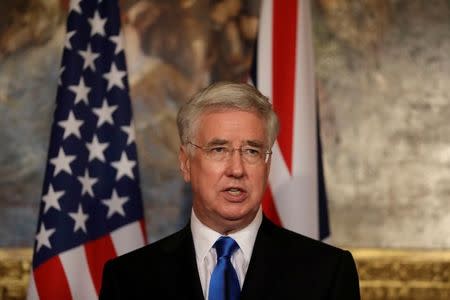 Britain's Defence Secretary Michael Fallon give a news conference with U.S. Defense Secretary James Mattis (not shown) at Lancaster House in London March 31, 2017. REUTERS/Matt Dunham/Pool