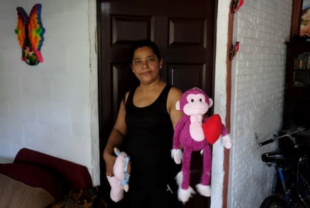 Rosa Ramirez, mother of a migrant who drowned in the Rio Grande River with his daughter during their journey to the U.S., is pictured at her house in the Altavista neighbourhood in San Martin