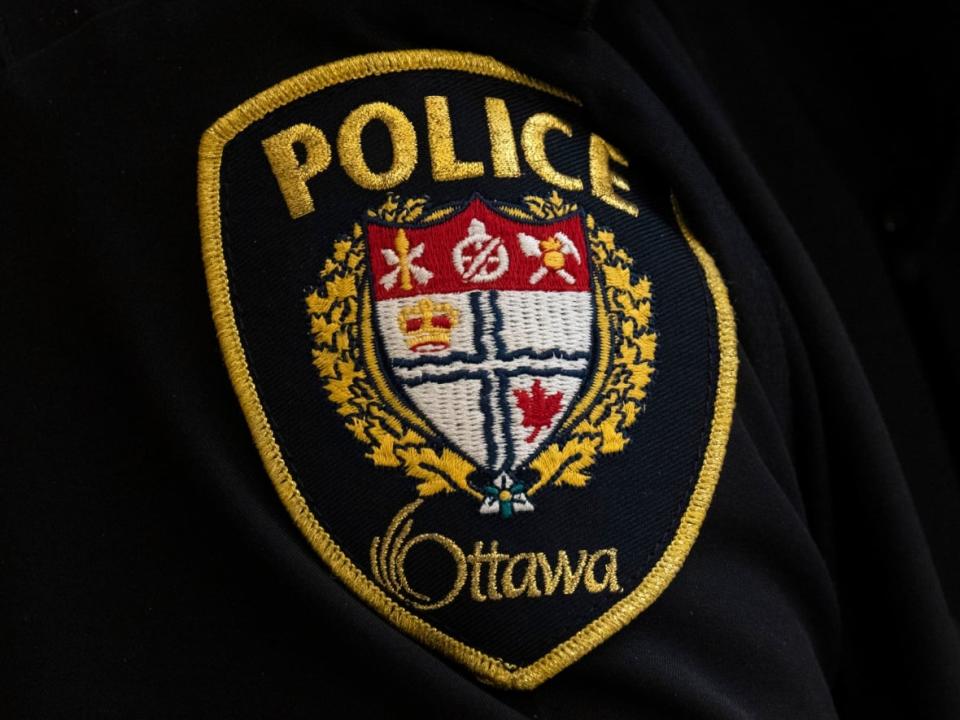 A close-up of an Ottawa Police Service badge in April 2022. (Adrian Wyld/The Canadian Press - image credit)
