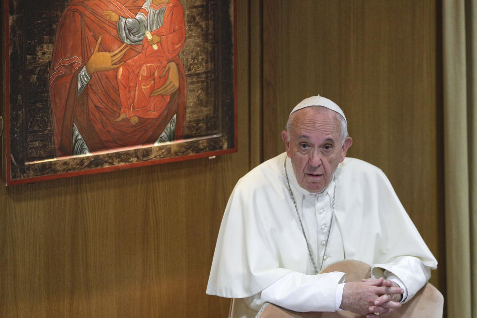 Pope Francis speaks during the opening session of the Amazon synod, at the Vatican, Monday, Oct. 7, 2019. Pope Francis opened a three-week meeting on preserving the rainforest and ministering to its native people as he fended off attacks from conservatives who are opposed to his ecological agenda. (AP Photo/Andrew Medichini)