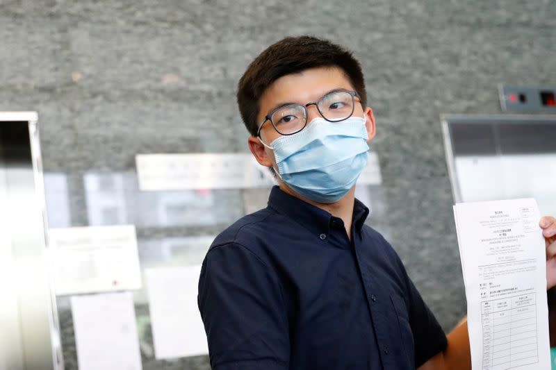 Pro-democracy activist Joshua Wong registers as a candidate for the upcoming Legislative Council election in Hong Kong