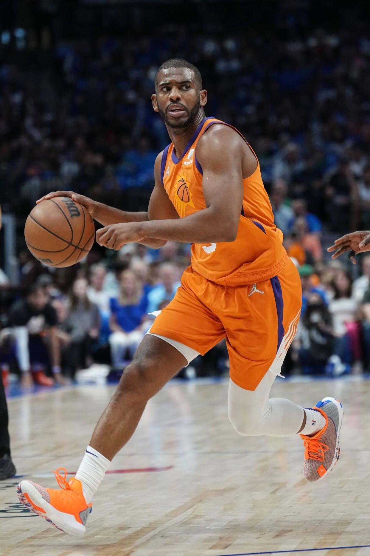 DALLAS, TX - MAY 8: Chris Paul #3 of the Phoenix Suns dribbles the ball during the game against the Dallas Mavericks during Game 4 of the 2022 NBA Playoffs Western Conference Semifinals on May 8, 2022 at the American Airlines Center in Dallas, Texas. NOTE TO USER: User expressly acknowledges and agrees that, by downloading and or using this photograph, User is consenting to the terms and conditions of the Getty Images License Agreement. Mandatory Copyright Notice: Copyright 2022 NBAE (Photo by Glenn James/NBAE via Getty Images)