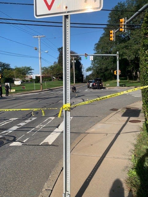 Newport police block off Admiral Kalbfus Road and Hillside Avenue following a fatal crash between a truck and bicycle on Wednesday morning.