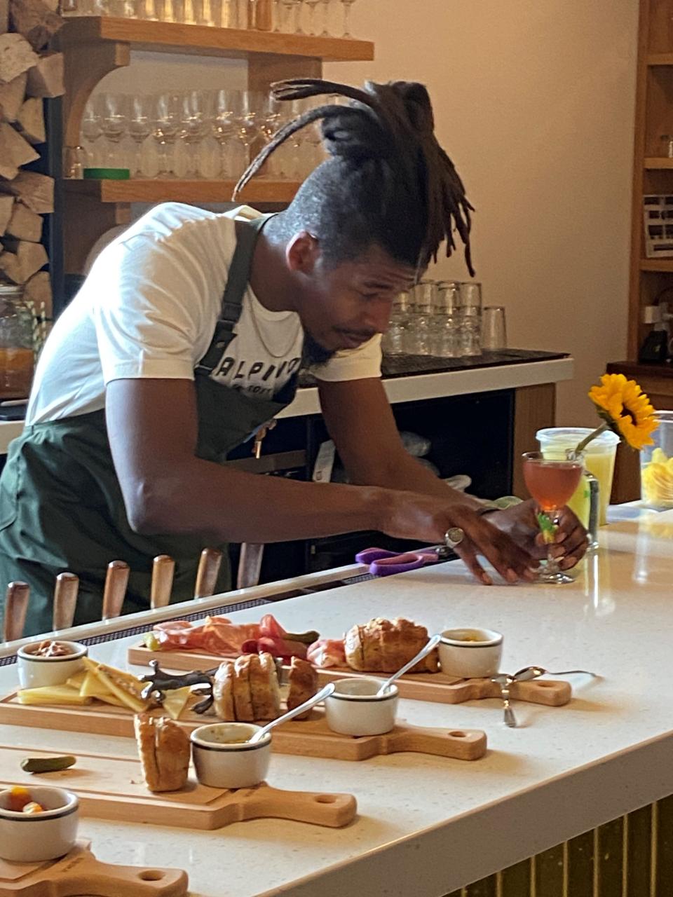 Andre Sykes prepares cocktails at Alpino Detroit in Corktown.