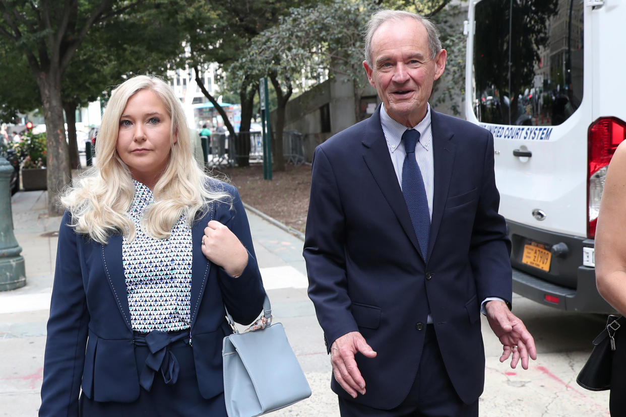 Lawyer David Boies arrives with his client Virginia Giuffre for hearing in the criminal case against Jeffrey Epstein, who died this month in what a New York City medical examiner ruled a suicide, at Federal Court in New York, U.S., August 27, 2019. REUTERS/Shannon Stapleton