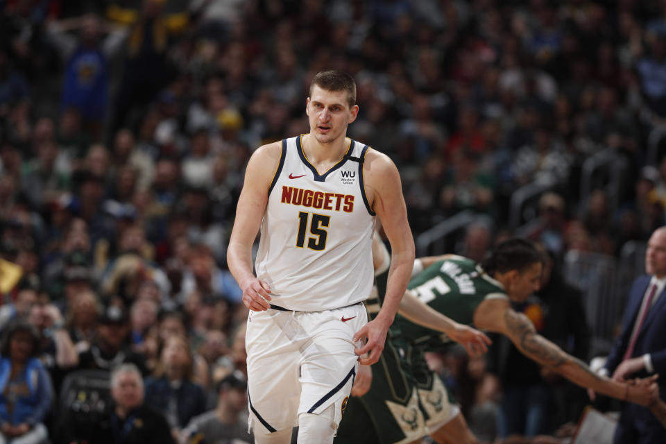 Denver Nuggets center Nikola Jokic (15) in the second half of an NBA basketball game Monday, March 9, 2020, in Denver. The Nuggets won 109-95. (AP Photo/David Zalubowski)