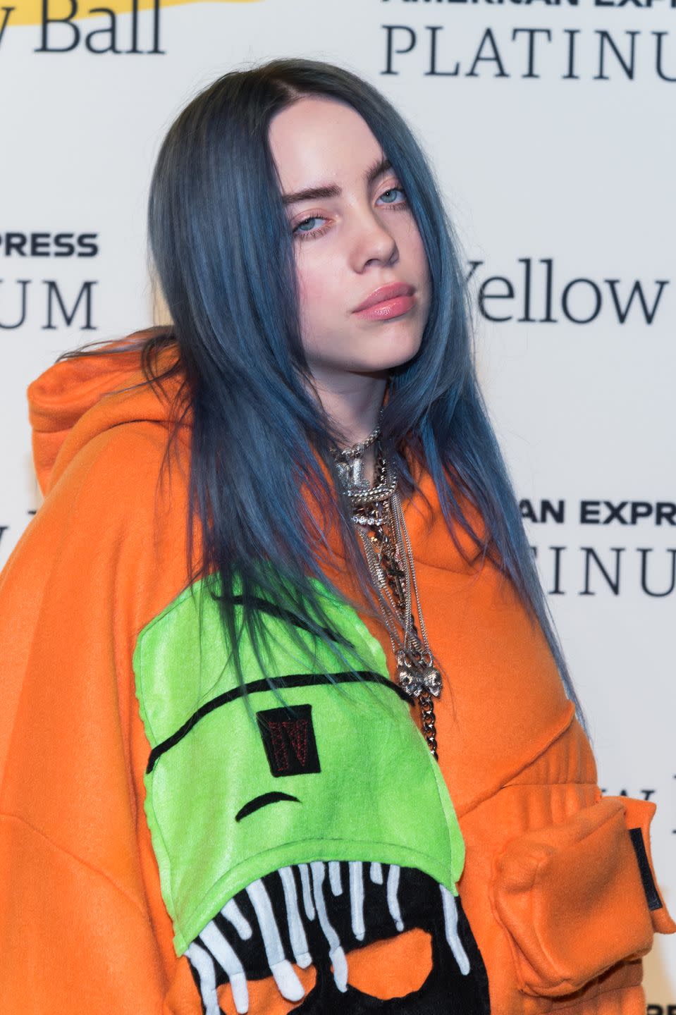 <p>Blue may be Billie's least favorite color, but she just keeps killin' it again and again. She revealed a new iteration on her signature color while attending an event at the Yellow Ball in '18. </p>