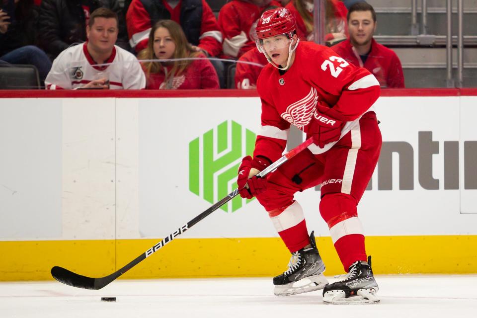 Detroit Red Wings right wing Lucas Raymond (23) looks for an open man during the second period against the Buffalo Sabres at Little Caesars Arena in Detroit on Saturday, Jan. 15, 2022.