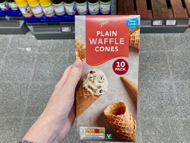 box of plain waffle cone 10-pack in someone's hand at an aldi