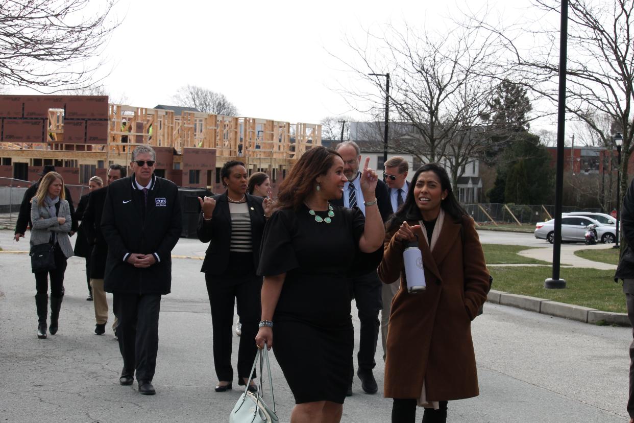 Newport Housing Authority Executive Director Rhonda Mitchell gave state and federal officials a tour of Park Holm, one of the city's affordable housing complexes, on Wednesday.