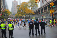 <p>A police presence is seen as runner gives cross into Manhattan during the 2017 New York City Marathon, Nov. 5, 2017. (Photo: Gordon Donovan/Yahoo News) </p>